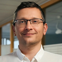 Porträtfoto von Dr. med. Yury Rusinovich.